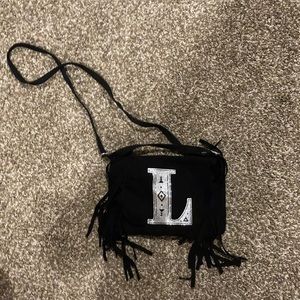 L font Justice cross body purse